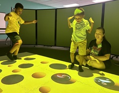 boys play on beam sensory floor