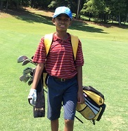 Lekotek child at golf tournament