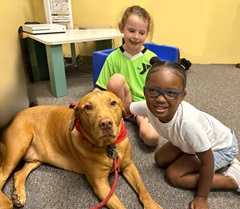 girls and a dog