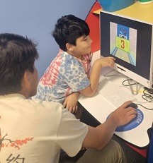 girl uses eyegaze to access computer